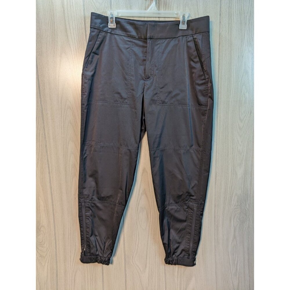 𝅺Athleta Radiant Jogger Pants Size 12 Tapered Leg Pockets Shiny Zip Ankle Black